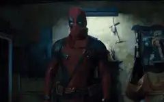 Deadpool materializes from smoke