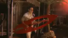 Bridget Fonda playing the red Kahuna guitar