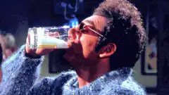Elvis smoking and drinking milk