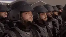 Riot cop doing his part