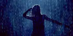 Woman dancing in the rain