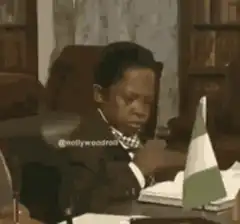 Young boy nodding off at desk