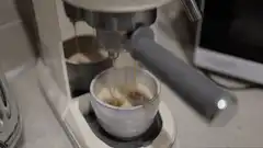 Espresso pouring into a cup