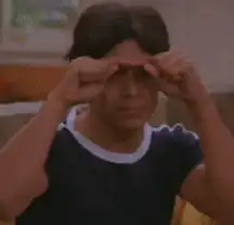 Man points to his eyes