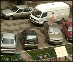 Naked man jumps across cars