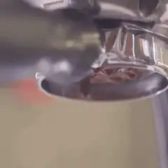espresso pouring from machine