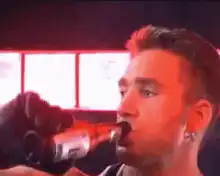 Man gets beer poured on head