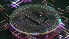 Bitcoin coin on circuit board