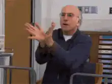 Larry David and Frank Costanza clapping