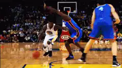 basketball player falls while dribbling