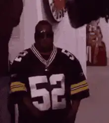 Biggie Smalls wearing jersey 52