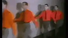 Man in red shirt dancing with clones
