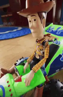 Woody drinks from a bottle with aliens watching