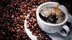 Coffee being poured into a cup