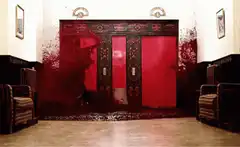 Elevator filled with red smoke