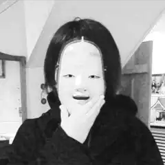 Woman with glowing face mask