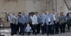 Prisoners dancing in prison yard