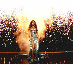 Beyonce in silver dress with pyrotechnics