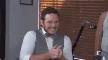 Chris Pratt clapping and smiling