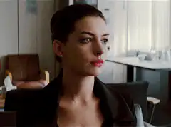 Anne Hathaway closes eyes