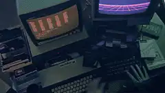 Hands typing on retro computer
