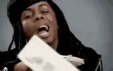 Lil Wayne throwing money