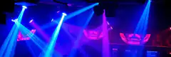 blue and purple laser lights at concert