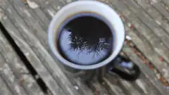 Coffee cup with magnetic field lines