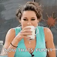 Woman drinking coffee and laughing