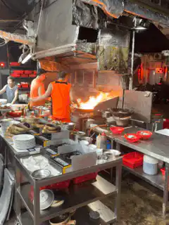 chef cooking with large flames