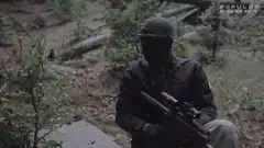 Guy with rifle says fuck the surveillance state