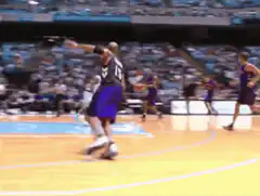 Basketball player dunking the ball
