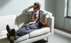 Tom Cruise as Maverick on couch