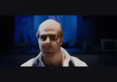 Bald man in sunglasses nodding