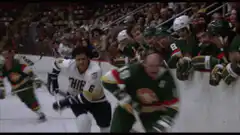 Hockey player gets hit by bench players