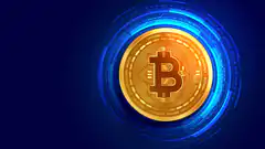 Bitcoin coin with glowing blue tech rings