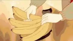Hands picking a banana from a bunch