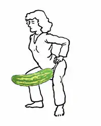 woman holding a cucumber