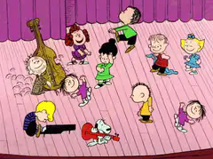 Peanuts kids dancing on stage