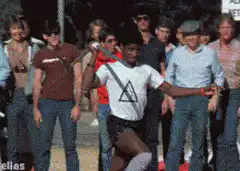 Michael Johnson running with a spear