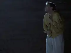 Man in yellow jacket gets soaked by water
