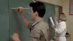 Mr. Sweeney hits himself with ruler