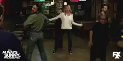 Mac and Dennis dance in Paddy's Pub