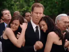 Gary Cole screaming while hugging two women