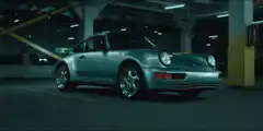 Porsche 911 Turbo drifts in parking garage