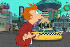 Fry points at a flying taxi