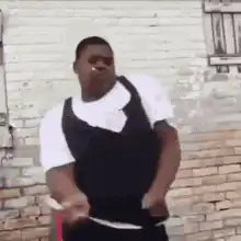 Man in vest dancing