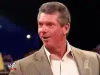 Vince McMahon laughing and falling over