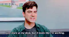 Ted Mosby staring at desk working