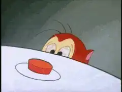 Droopy eats a piece of meat